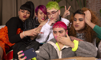 Transgender and nonbinary young adults pose for a group selfie