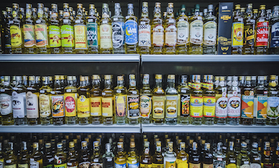 Shelves of bottles in a Brazilian liquor store.