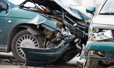 Two totaled cars after a collision 