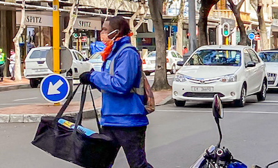 A food delivery worker wearing a mask in Cape Town