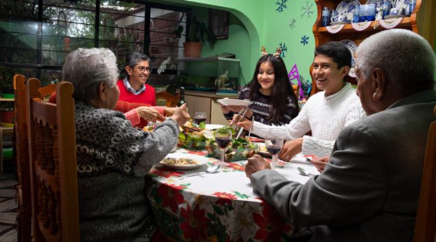 Hispanic family eating dinner