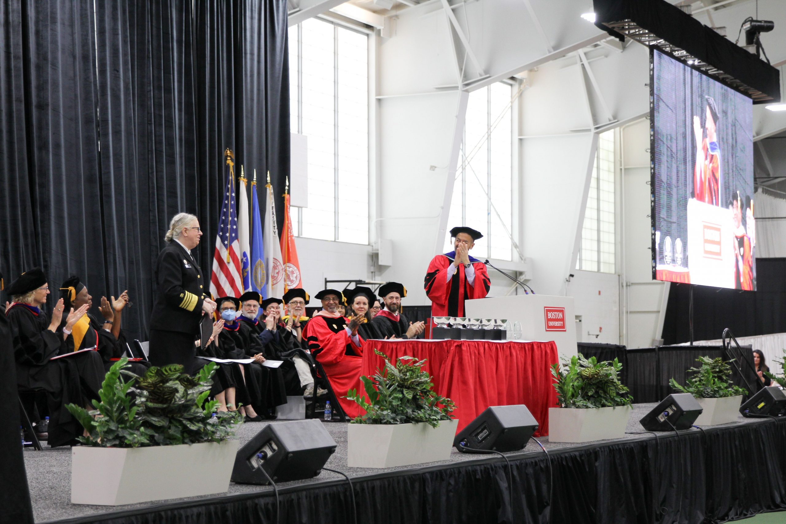 Rachel Levine And Dean Galea on stage at convocation