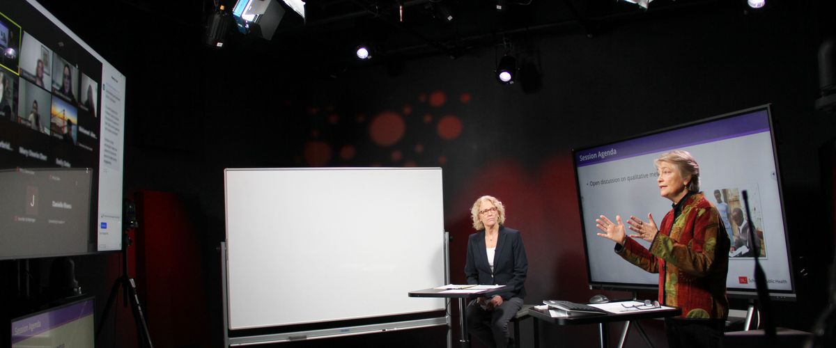 Lisa Sullivan (left), associate dean for education, and Lora Sabin (right), associate professor of global health, speak with Online MPH students over Zoom from the BU Virtual studio where SPH faculty record instructional content and hold weekly live sessions.
