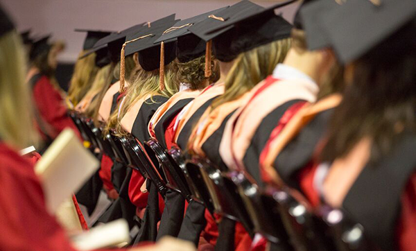 Graduates backs and caps at convocation