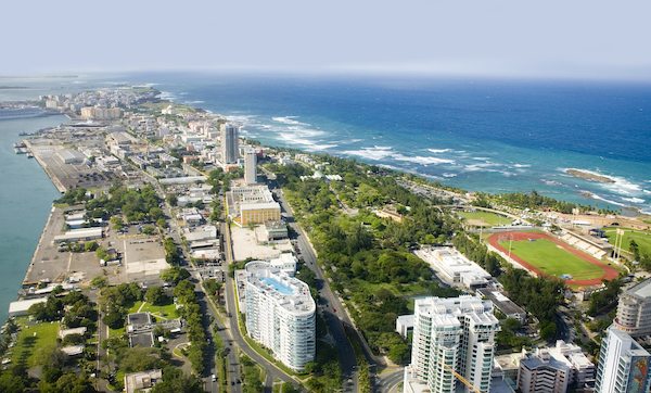 Aerial view of the Northern side of Puerto Rico. Shown is the North edge shore of the island between Puerta de Tierra and Fuerte de San Geronimo with Old San Juan in rear.