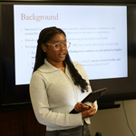 A CTMH student fellow presents research findings.