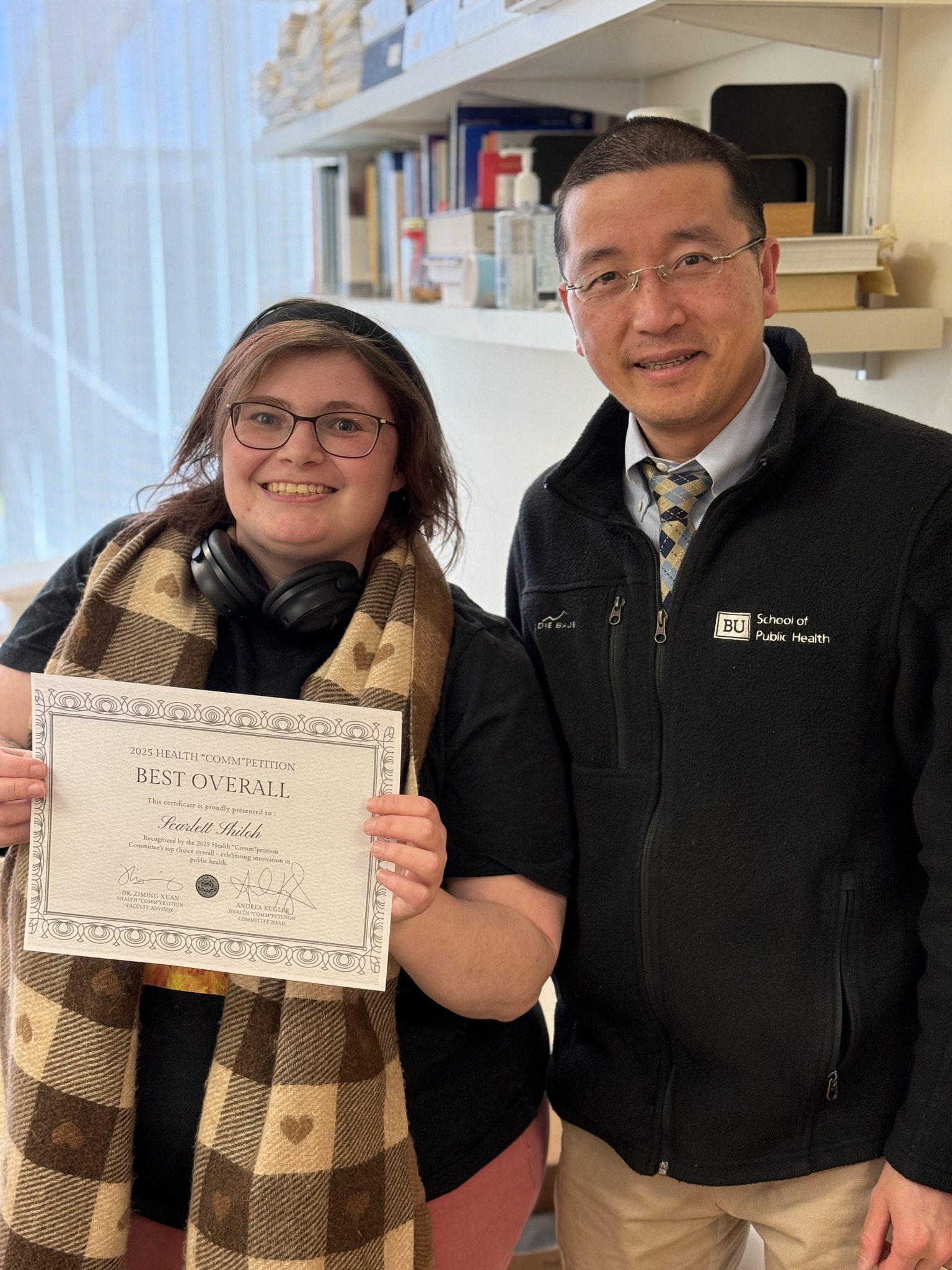 Scarlett Shiloh (left), winner of the 2025 Health "Comm"petition best overall award, with Ziming Xuan