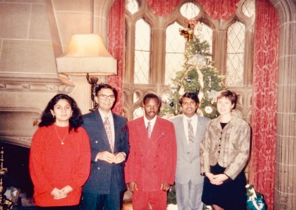 Ghulam Nabi Kazi (second from left) with his wife Khowla (left) and classmates—Bamoussa, Pathi, and Ariana—during their graduation at the BU Castle, December 1995.