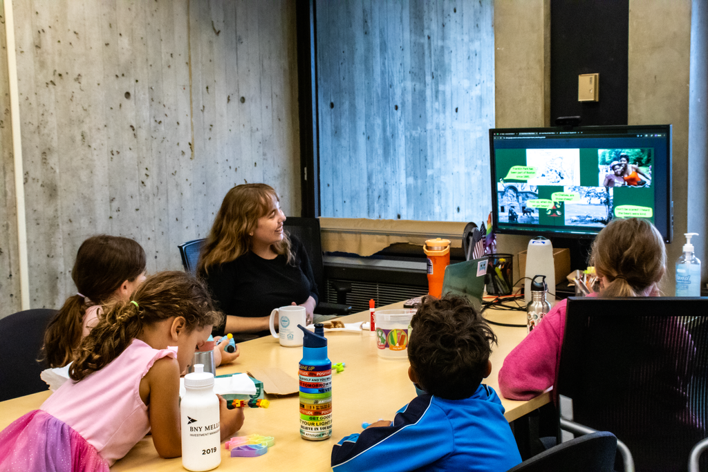 Corryn conducts a focus group with elementary school children on the social stories she helped to draft for Boston Public Schools while working as a MONUM summer fellow.