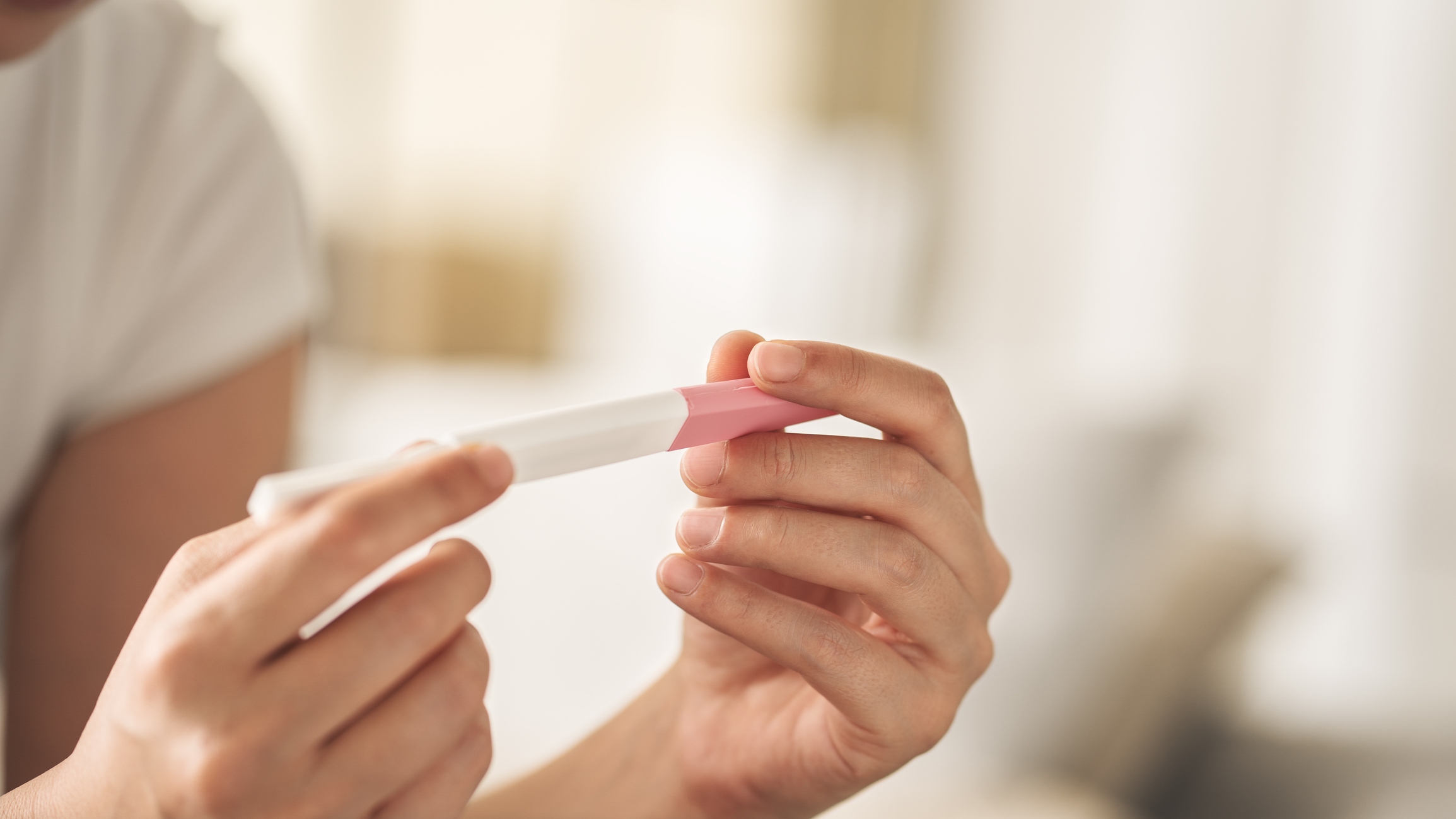 Woman waiting for pregnancy test result
