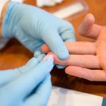 Patient getting a blood test from a doctor