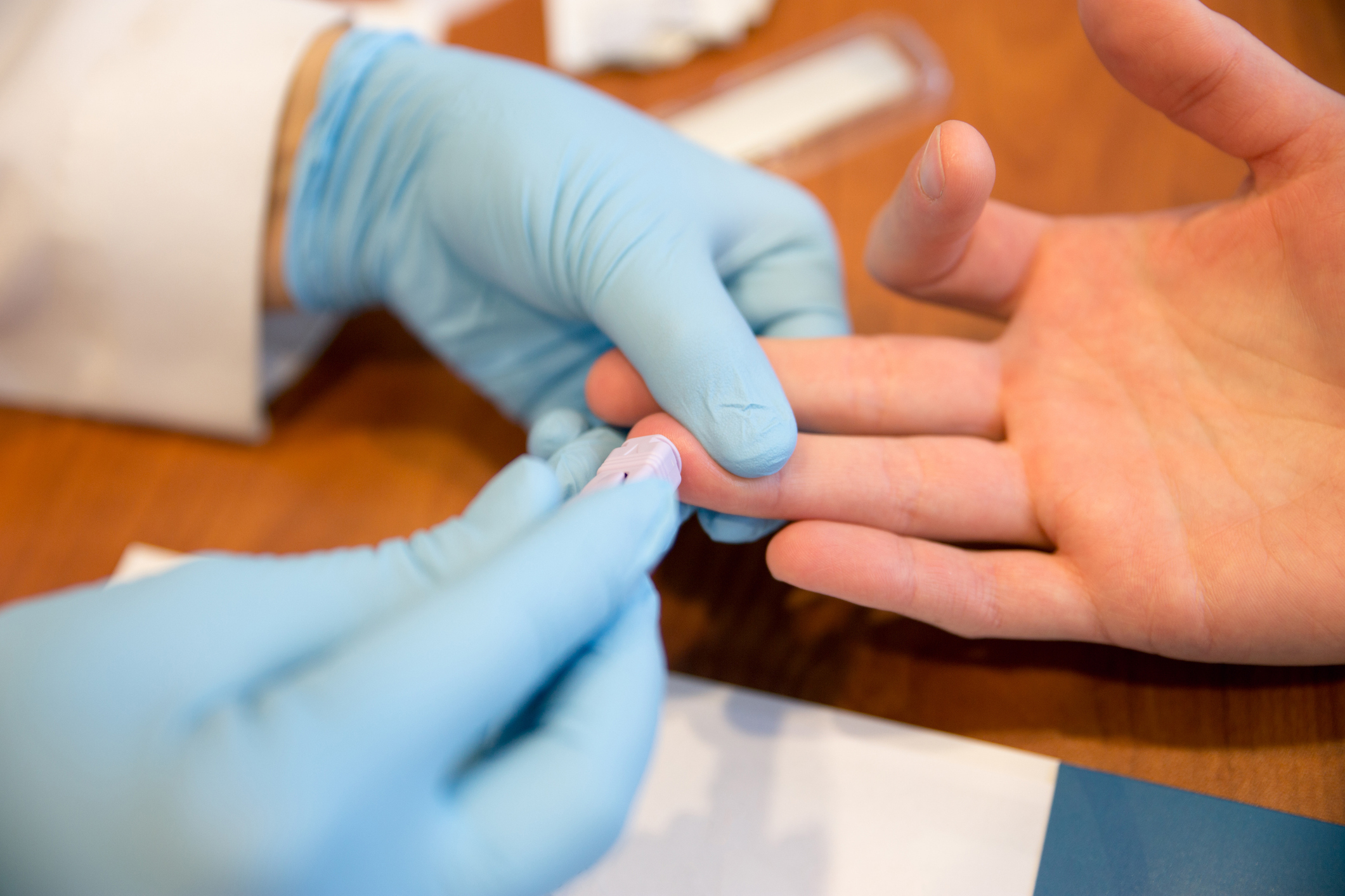 Patient getting a blood test from a doctor