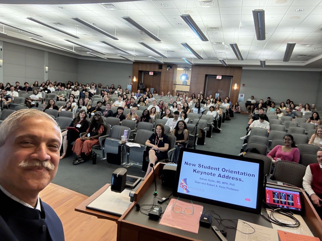 Dean Hyder captures a selfie with new students after delivering the keynote address at student orientation fall 2026. Photo: Adnan Hyder