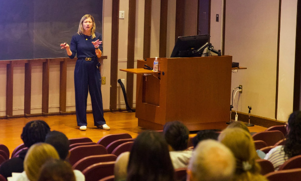 Lindsay Jubelt addresses an audience of students, faculty, and staff at the School of Public Health during the 6th annual Charles Donahue Lecture on October 26, 2026. Photo: Megan Jones