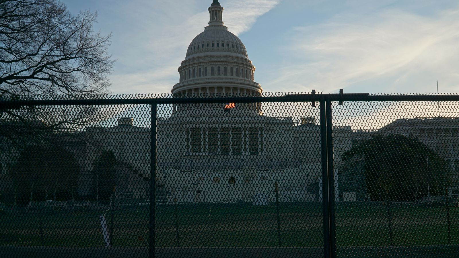 united-states-capitol-building-behind-gate-post-insurrection