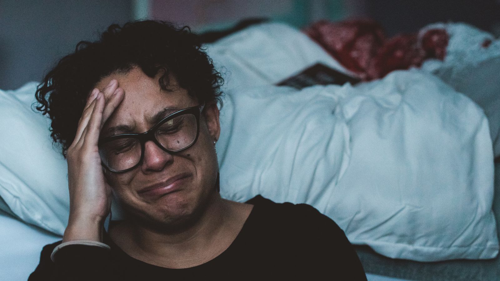 parent-sitting-on-floor-and-crying