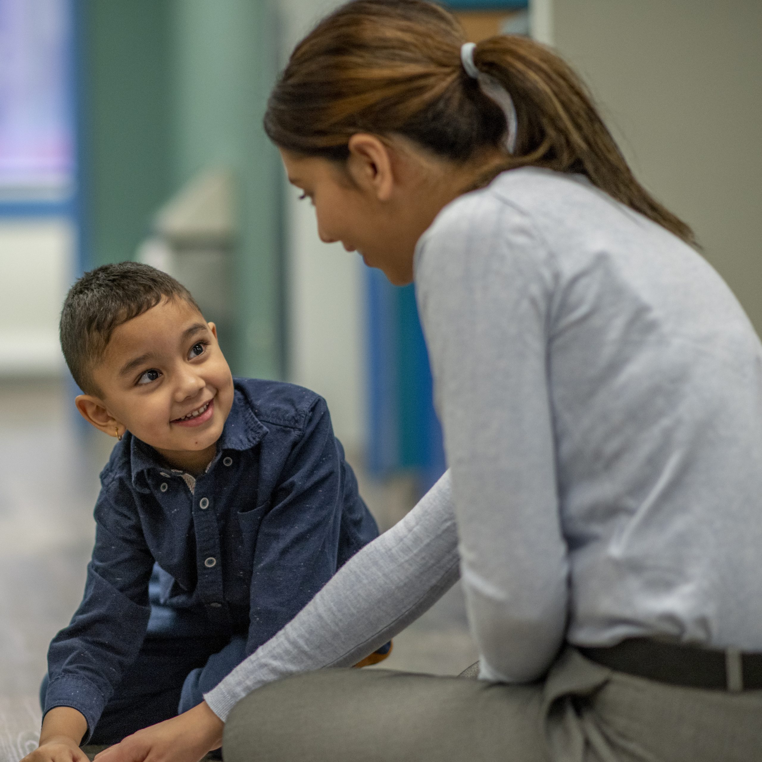  a therapist works with child 