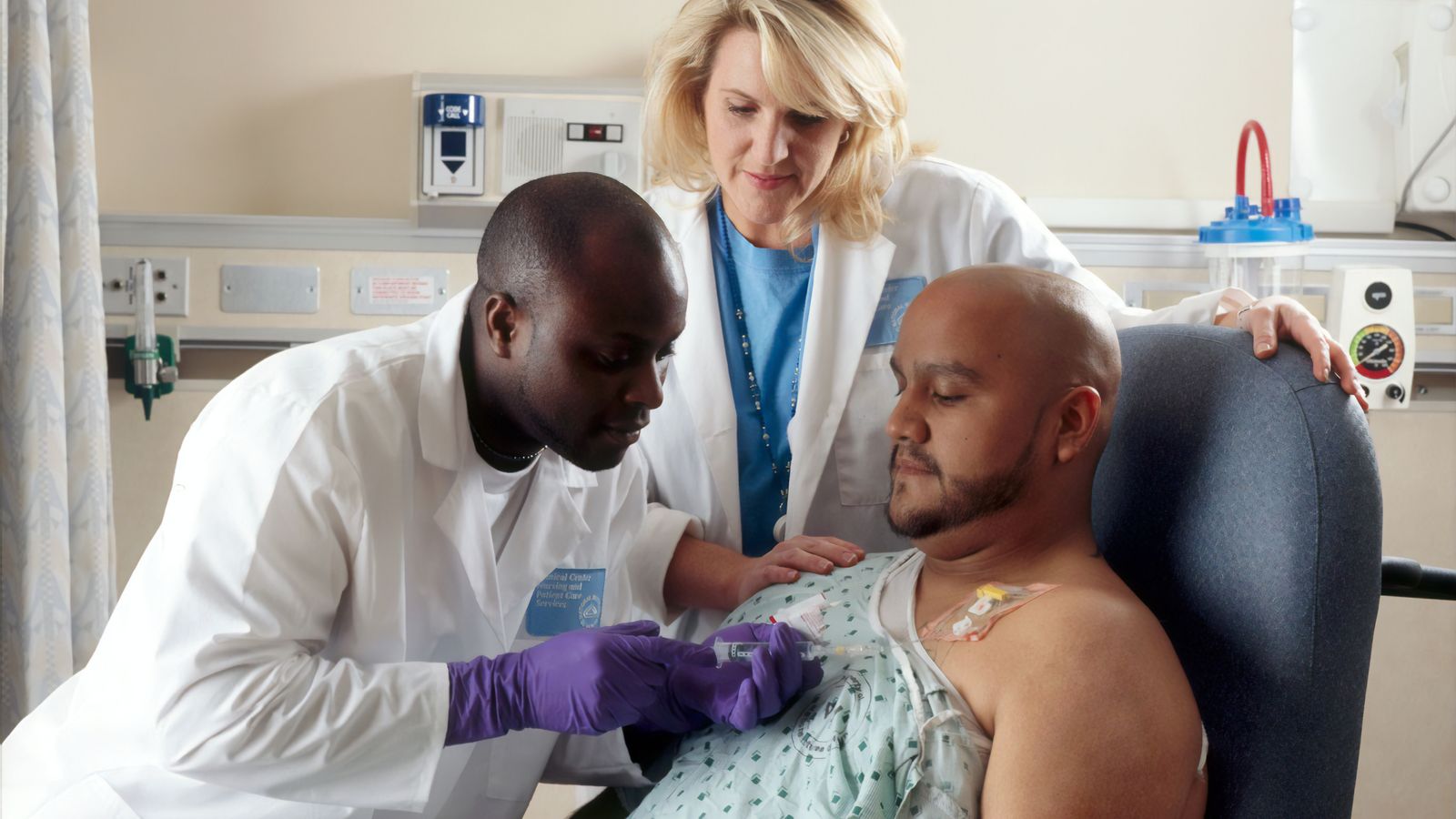 two-doctors-care-for-patient