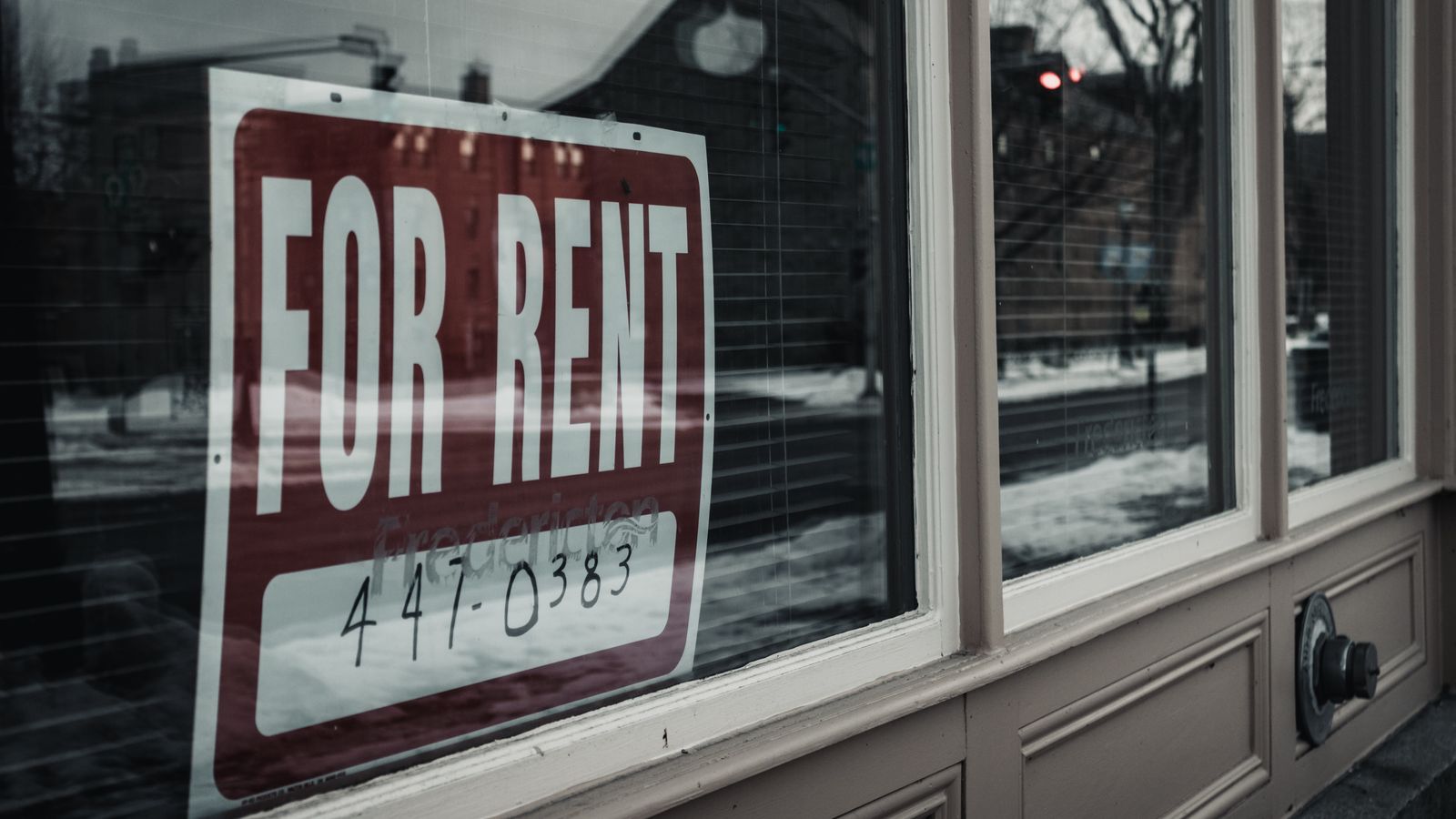 for-rent-sign-in-window