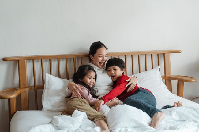 mother-and-children-play-in-bedroom