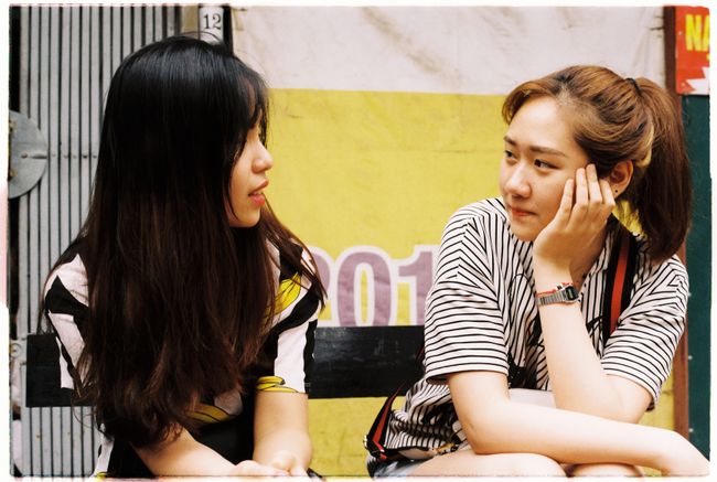 two-teens-talk-outside