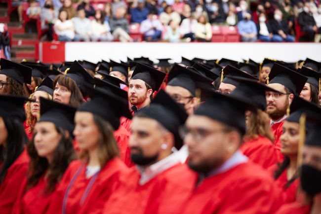 Graduates and guests watch the ceremony