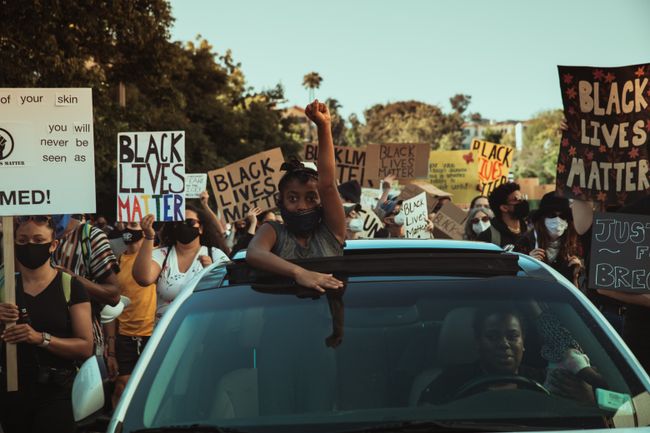child participates in black lives matter protest