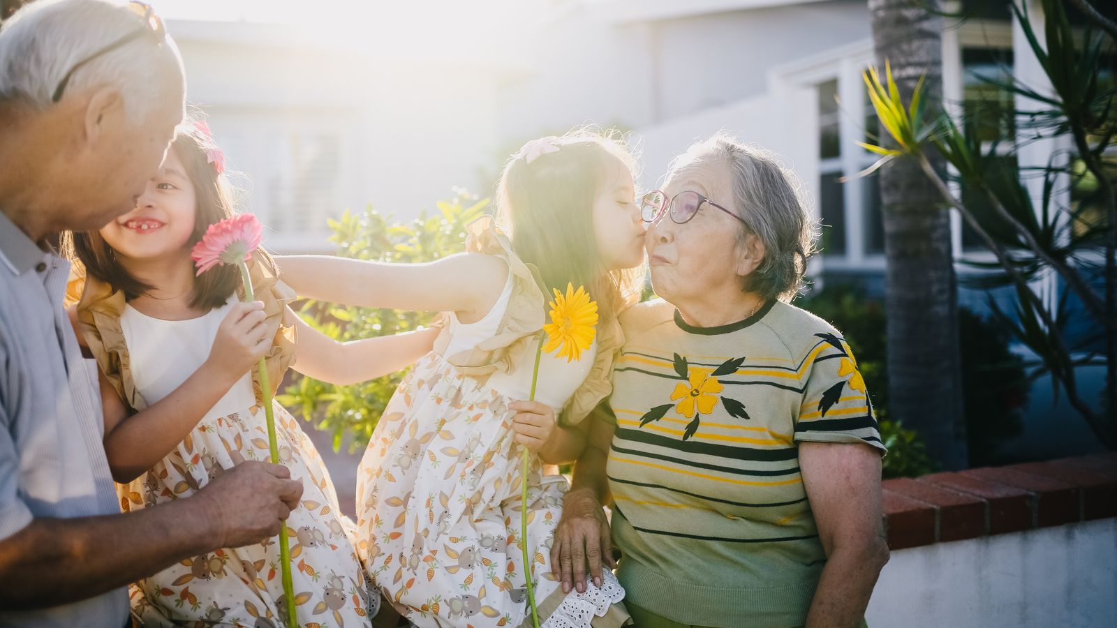 two children spending time with their grandparents