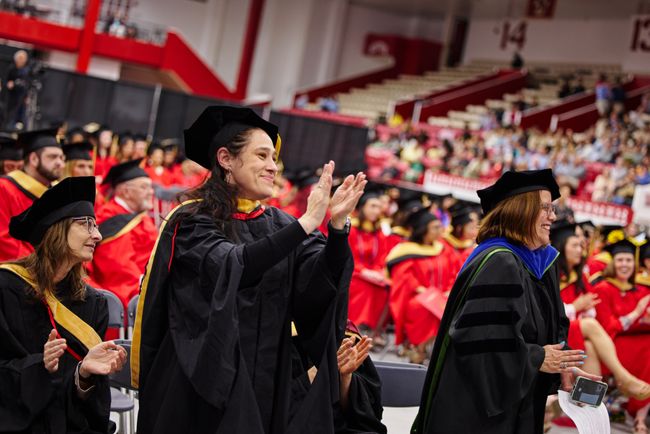 BUSSW faculty and administrators cheer for graduates