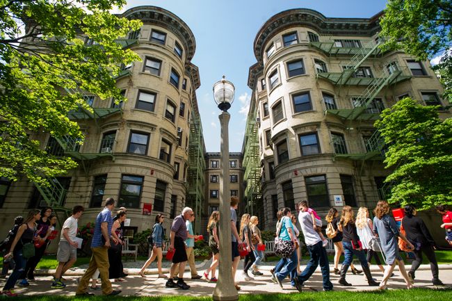 tour walking past ssw school building