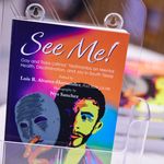 See Me! book on display at event