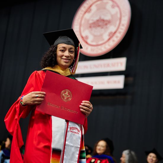 Graduate getting her diploma at commencement