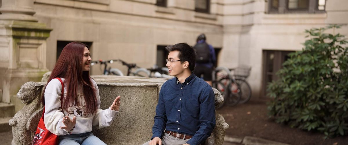 Students talking outside campus