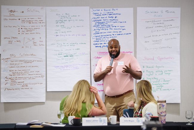 Male Presenter in Pink Shirt at Palliative-SW-Summit-2025-1005-650x434.jpeg
