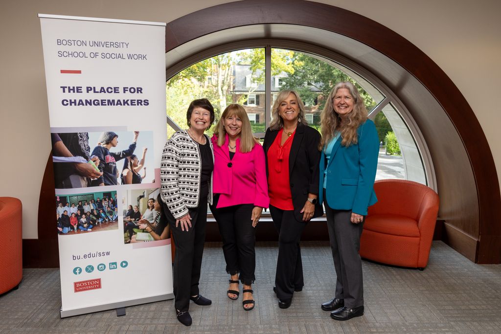 workshop presenters pose with dean jones