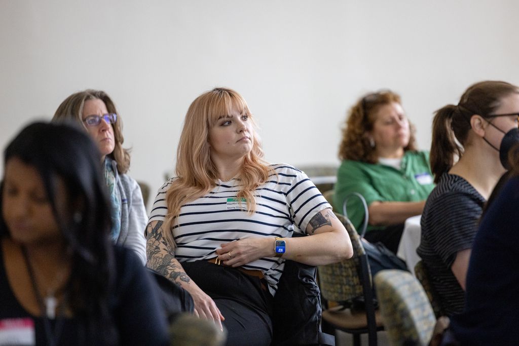 workshop attendees looking at presenter