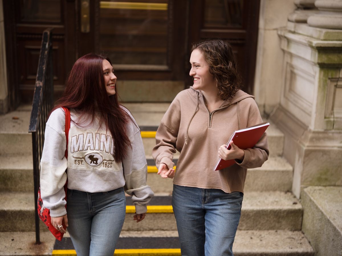 students in front of school