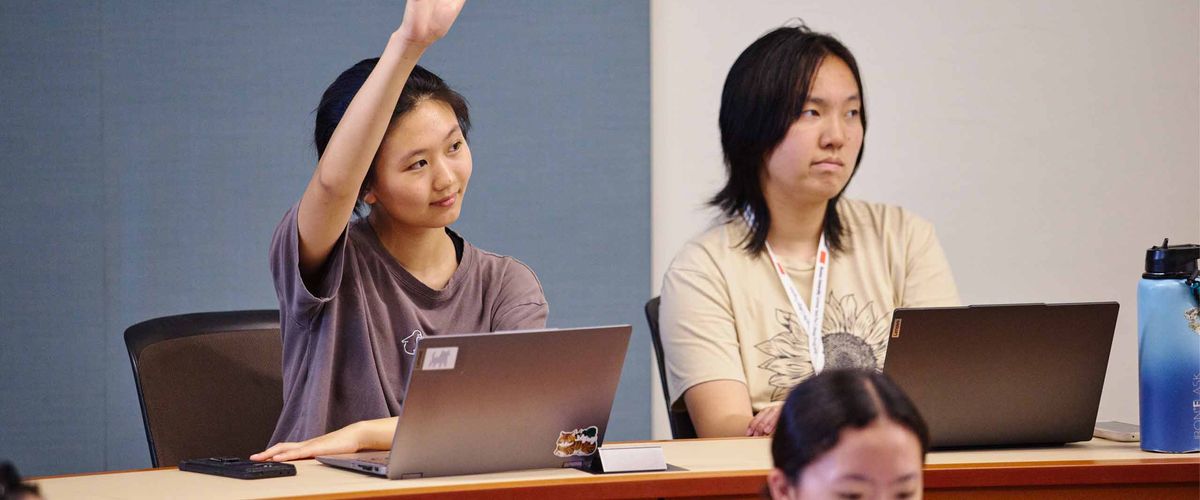 Boston University High School students engaged in an academic classroom environment.