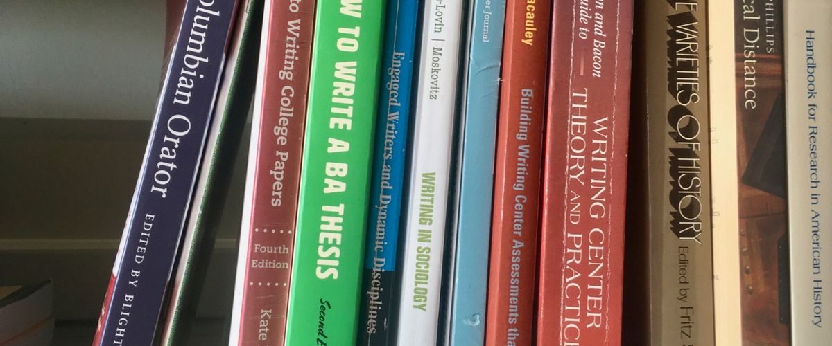 Composition and rhetoric books on a shelf