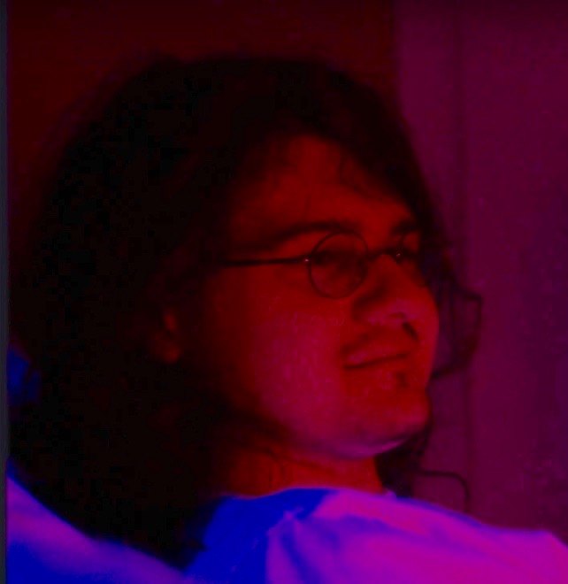 Headshot of Gianni Vaughan.