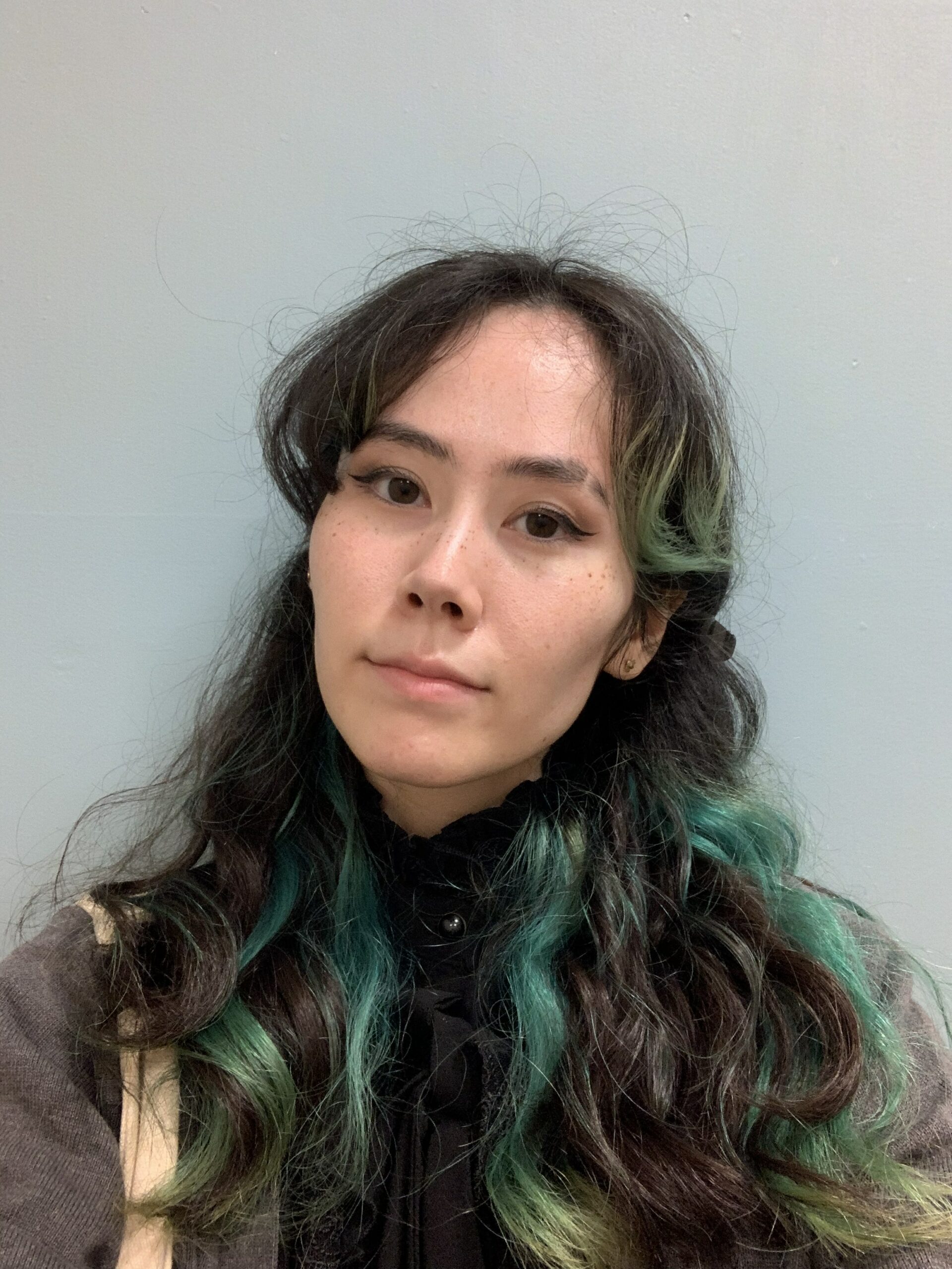 Headshot of Suis Burr.