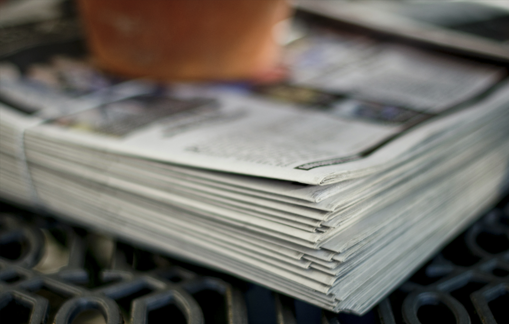 Stack of newspapers.