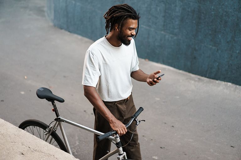 cyclist walking with bicycle