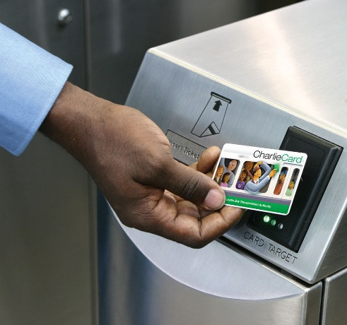 Close-up of Charlie Card being scanned at an MBTA fare gate