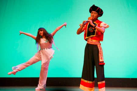 Student musician and dancer in traditional Chinese costumes