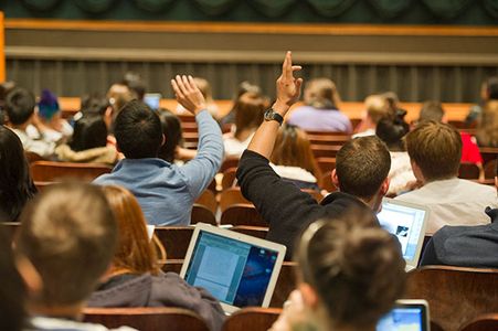 View of students with laptops during class