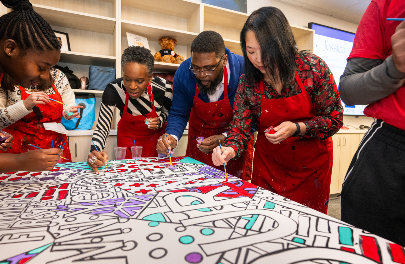 President Gilliam painting with students