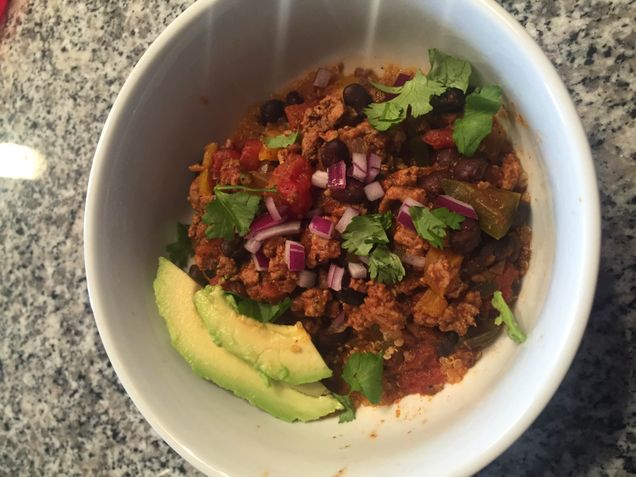 My sister, Kasey and I garnished our chili with some red onion, cilantro, and avocado. We even threw in a little quinoa! Photo Credit: From the photo library of Kasey Madden