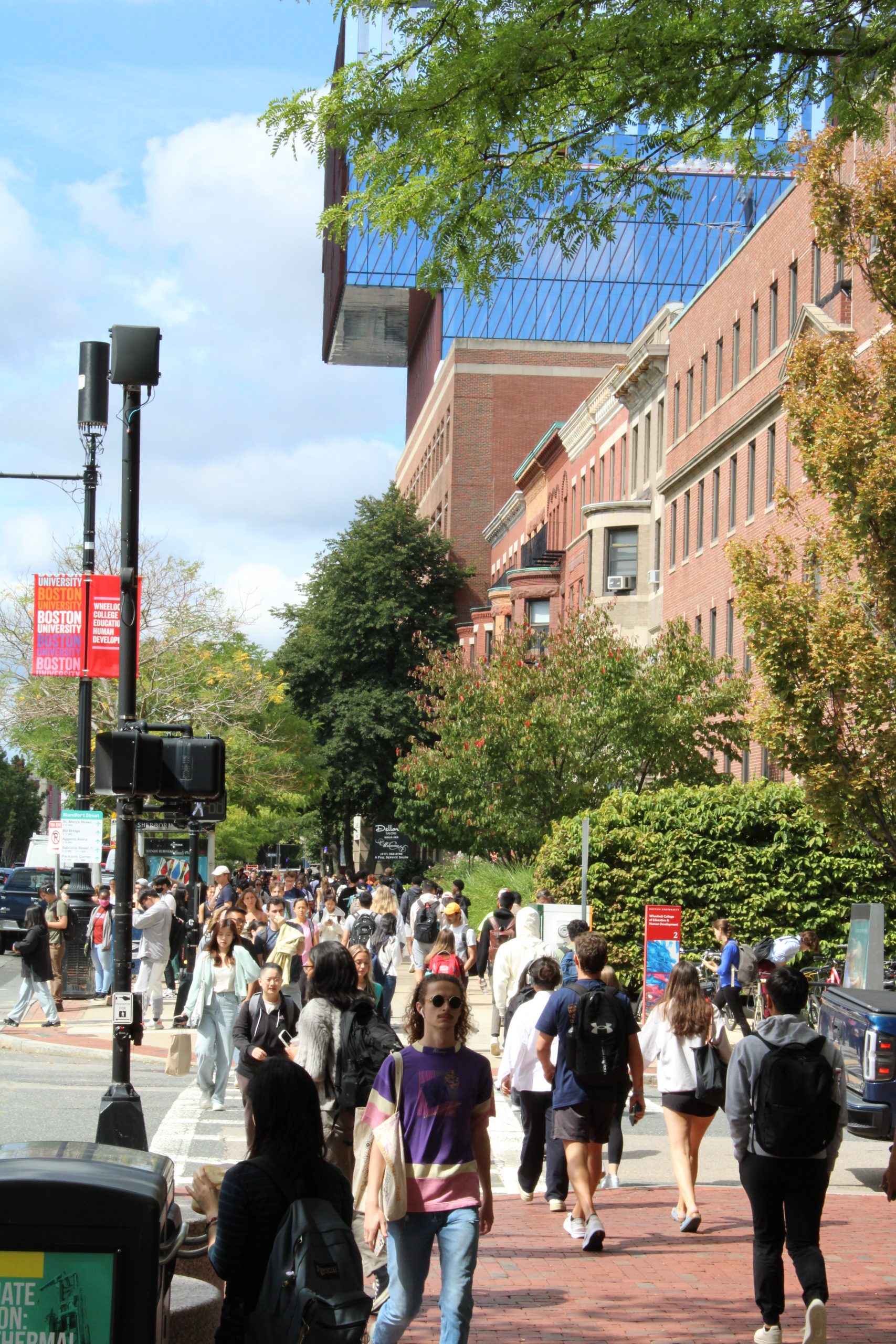 Exterior BU sidewalk full of students walking to class