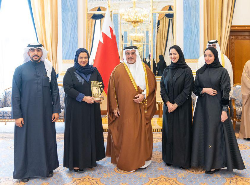 Shows male and female educators from Bahrain